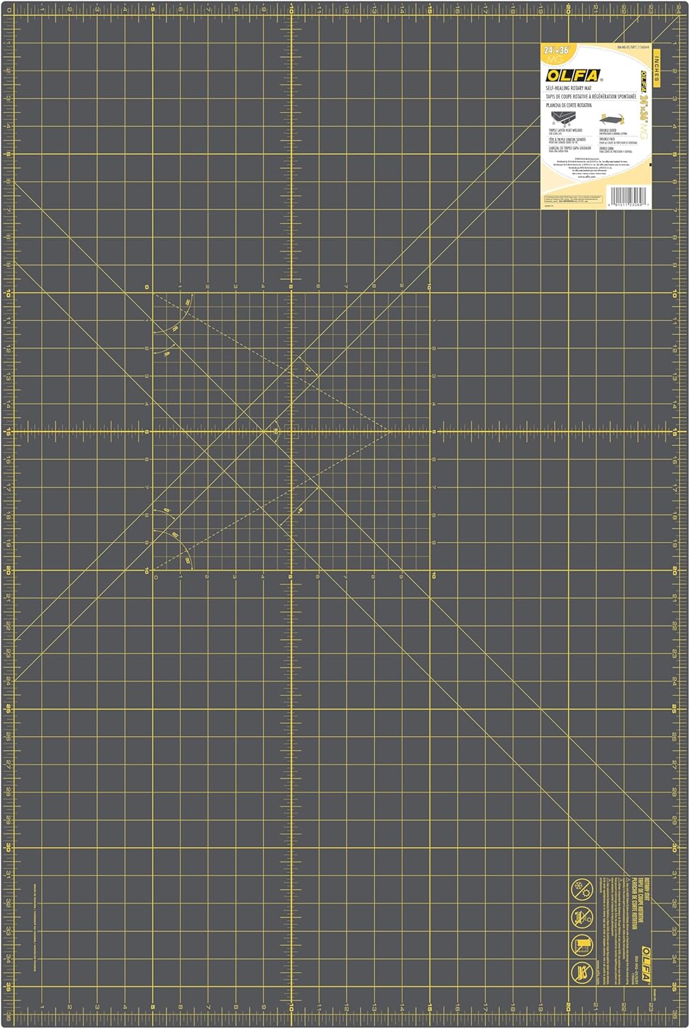 OLFA 24 x 36 inch gray double-sided self-healing rotary cutting mat with printed grid lines on one side
