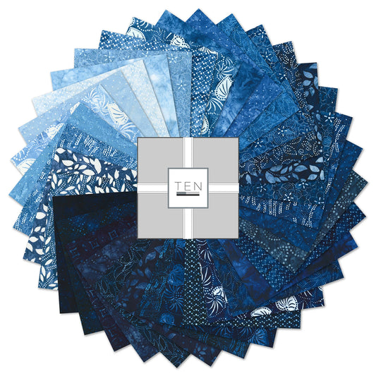 Stack of 42 Kasuri 10in blue quilting cotton squares with traditional-inspired patterns by Robert Kaufman
